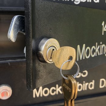 Landlord checking rental property locks